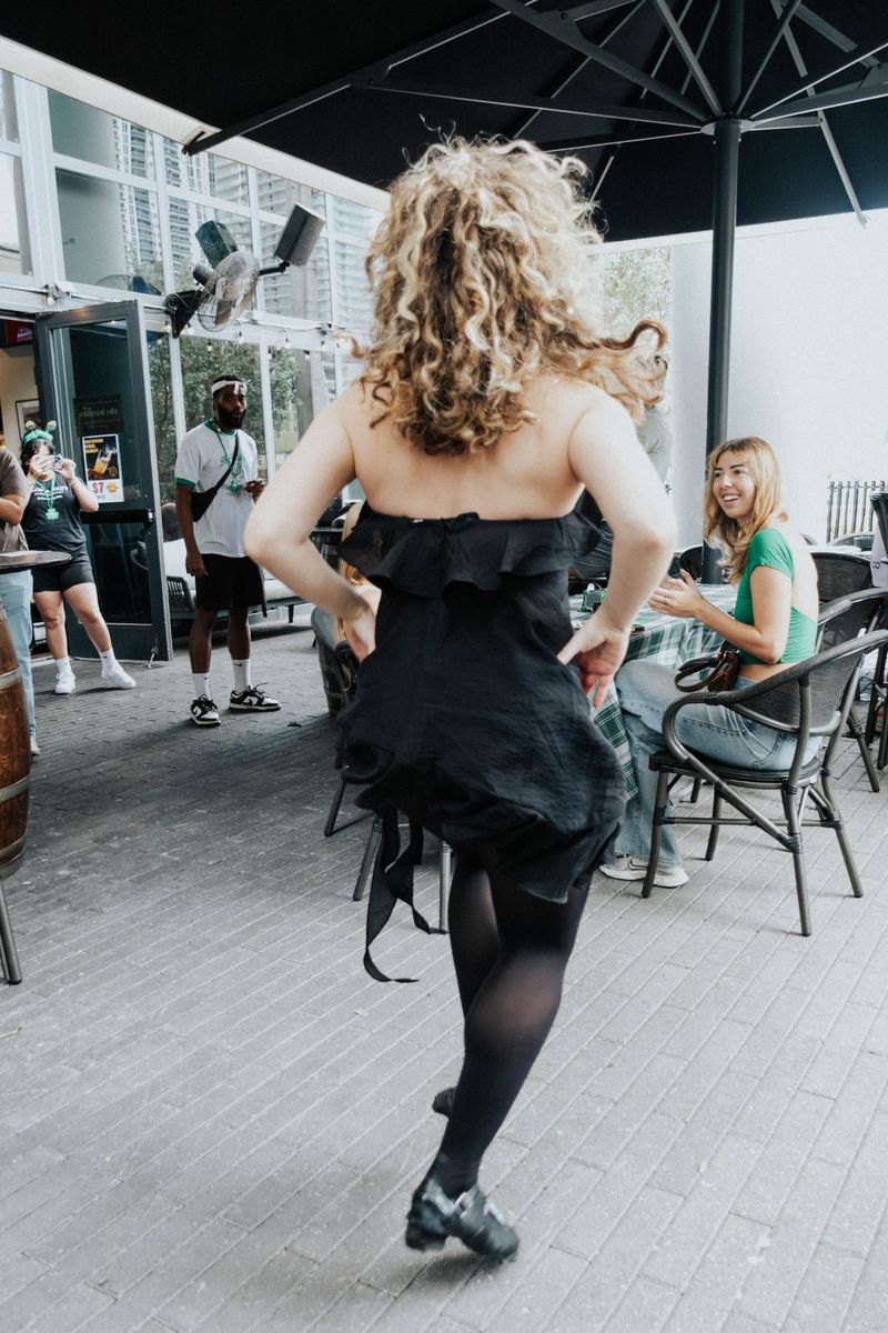 Irish dancer performing on the patio during St. Patrick's Day at The Leinster Miami