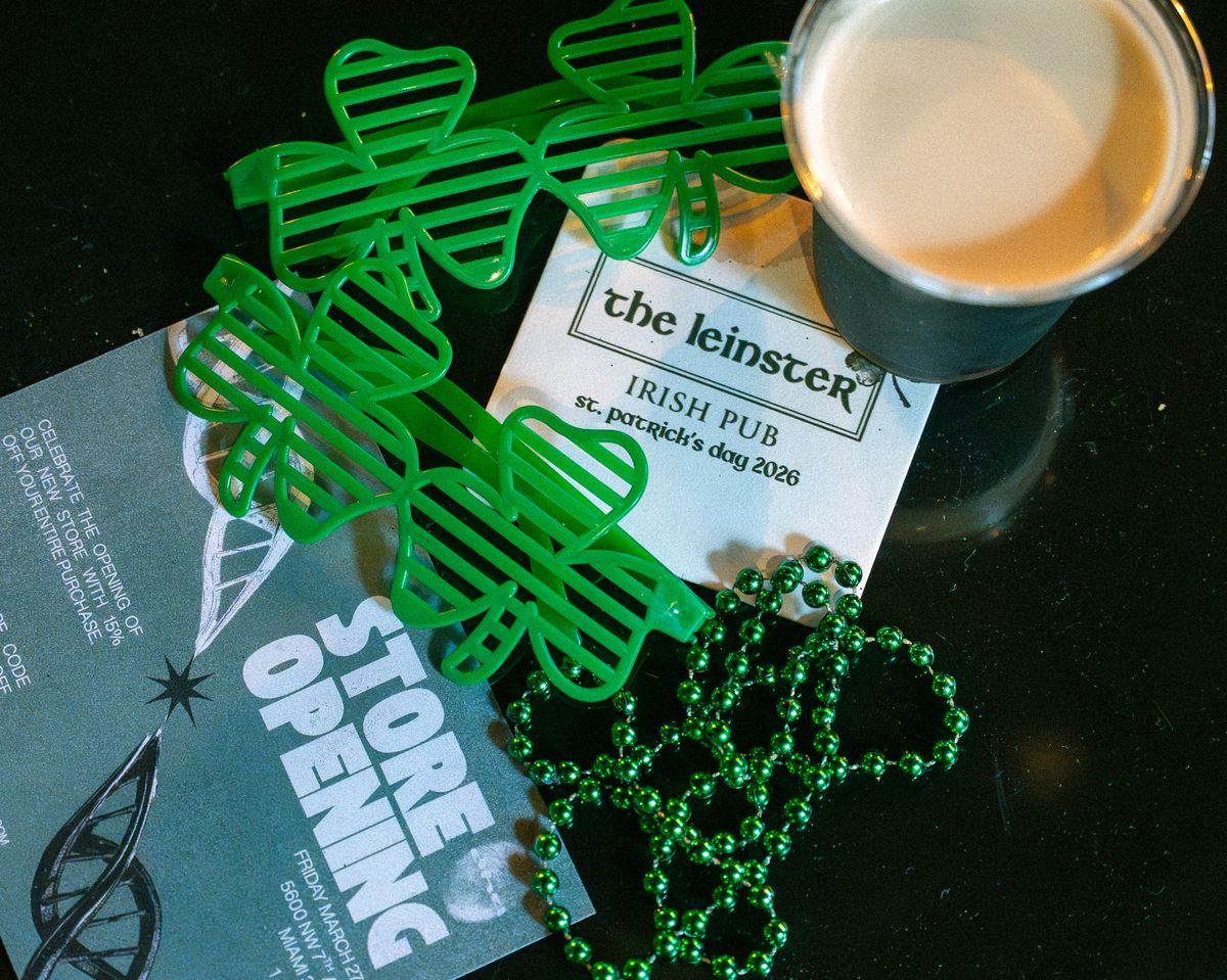 Shamrock glasses, green beads, and Leinster branded St. Patrick's Day coasters